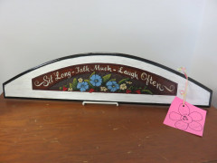 #63 Sit Long, Talk Much, Laugh Often Sign made & donated by Kim Klotzbach.
